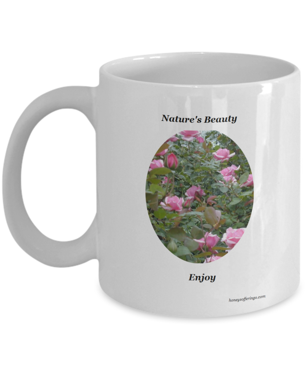 Pink Roses Gift Mug. This mug displays a cluster of beautiful light pink roses for one to enjoy while drinking their morning coffee or afternoon tea. This pink roses coffee mug is a great gift for almost any occassion. 