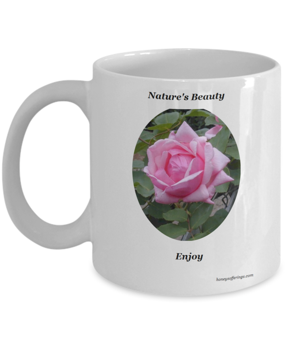 Single Pink Rose Mug for yourself or as a gift. Enjoy the beauty of this single pink rose on the sides of this coffee mug. The pink rose carries a meaning of joy, gentleness, appreciation and sweetness making it a special gift for so many people.