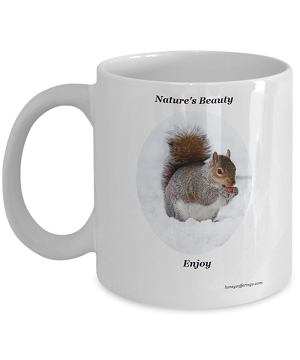 Squirrel Coffee Mug for the Squirrel Lover. This coffee mug makes a great gift to yourself or someone else who is a lover of squirrels. Nature scene of squirrel in snow on the sides of this mug.